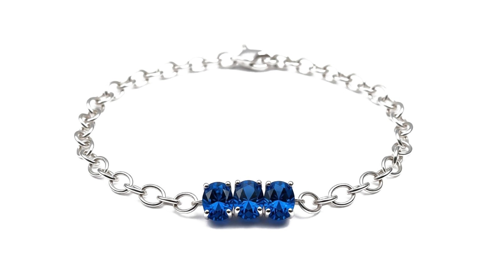 Pulseira em prata 950 corrente belcher com trio de safiras azul profundo corte oval em barra central