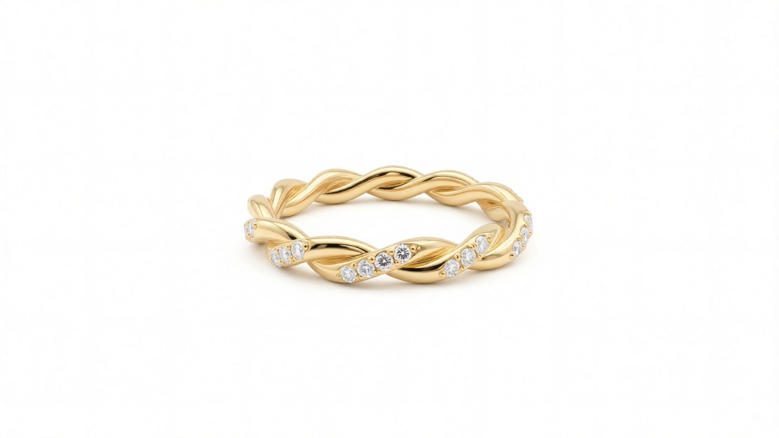 Anel Trançado de Diamante — ouro 18k amarelo em duas tranças entrelaçadas, uma lisa e outra em pavé de diamantes
